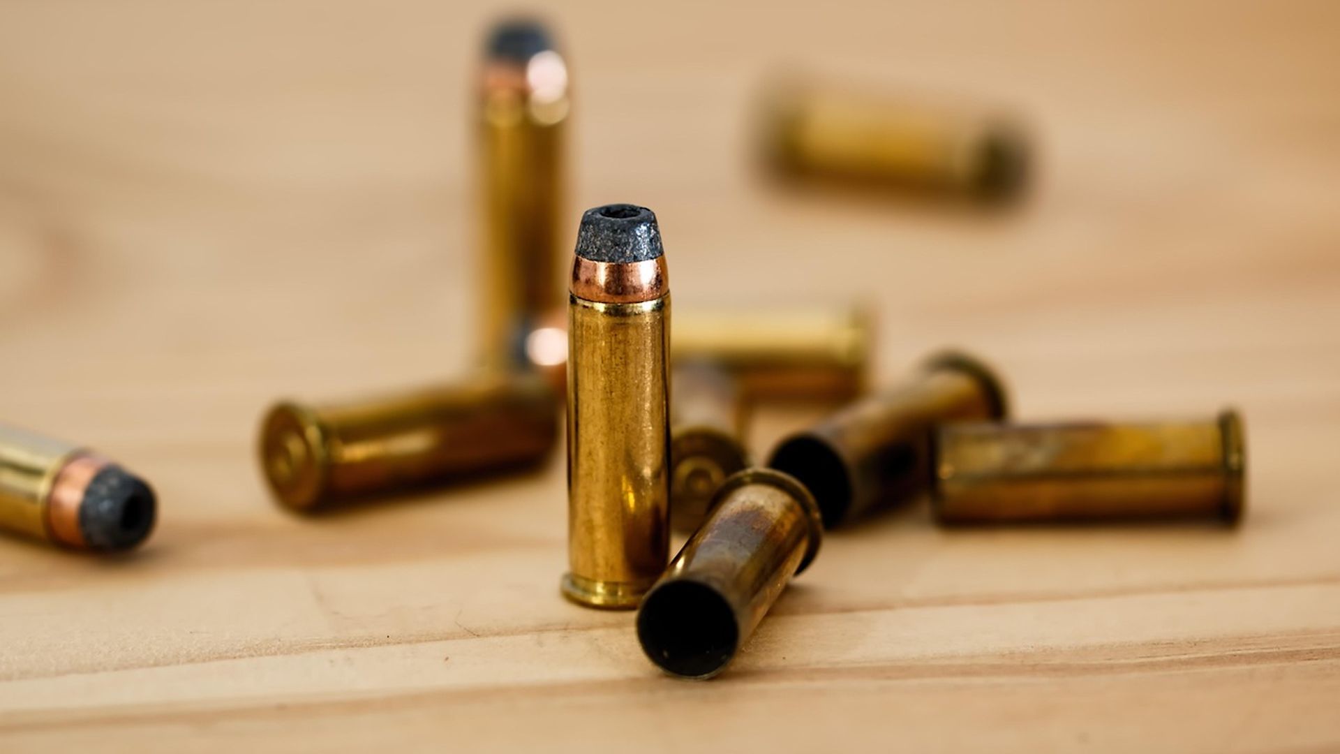 Rifle and pistol cartridges on a table