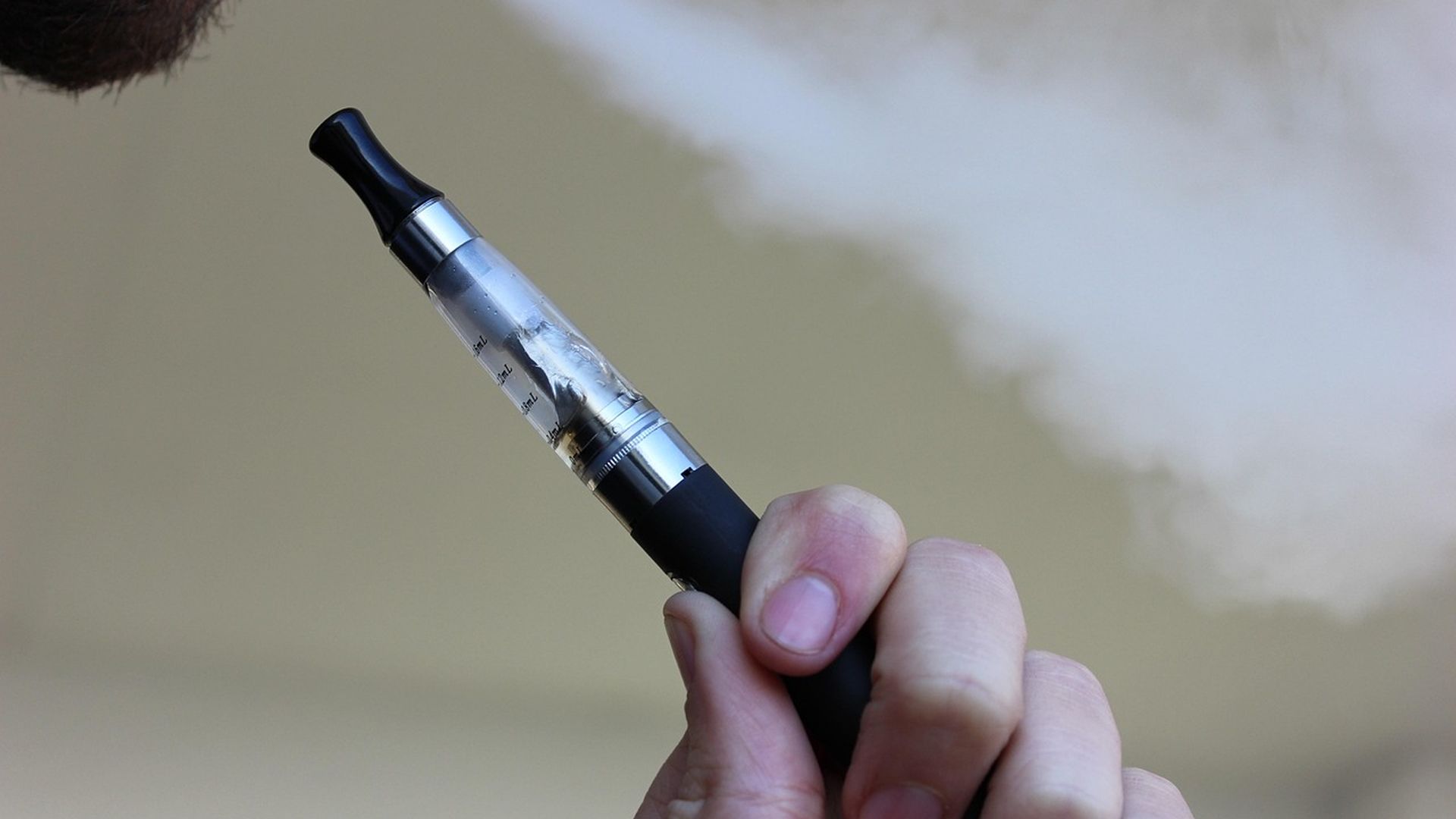 Hand holding an electronic cigarette